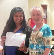 Ana receives 10 year membership certificate