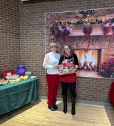 President Deb presents Santa's Favourite, Alana, with thank you gift